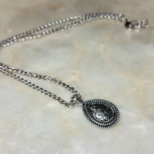 Elegant Silver Swirl Pendant Necklace